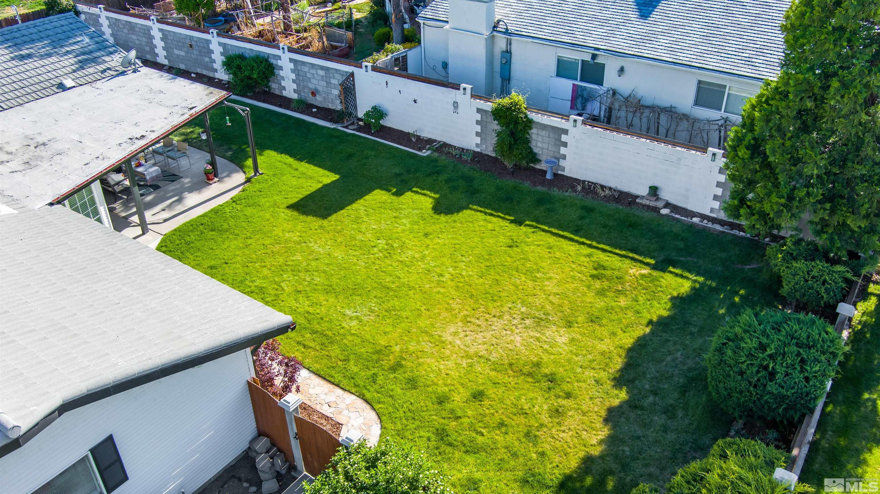 3901 Warren Way Reno, NV 89509 - Photo 35 of 40 a view of a backyard with plants