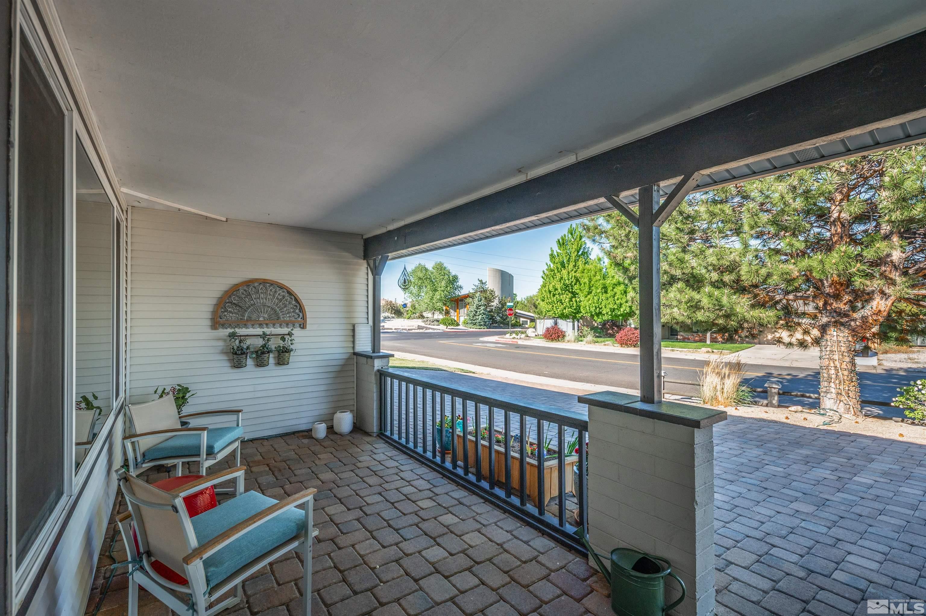 3901 Warren Way Reno, NV 89509 - Photo 8 of 40 a balcony with wooden floor