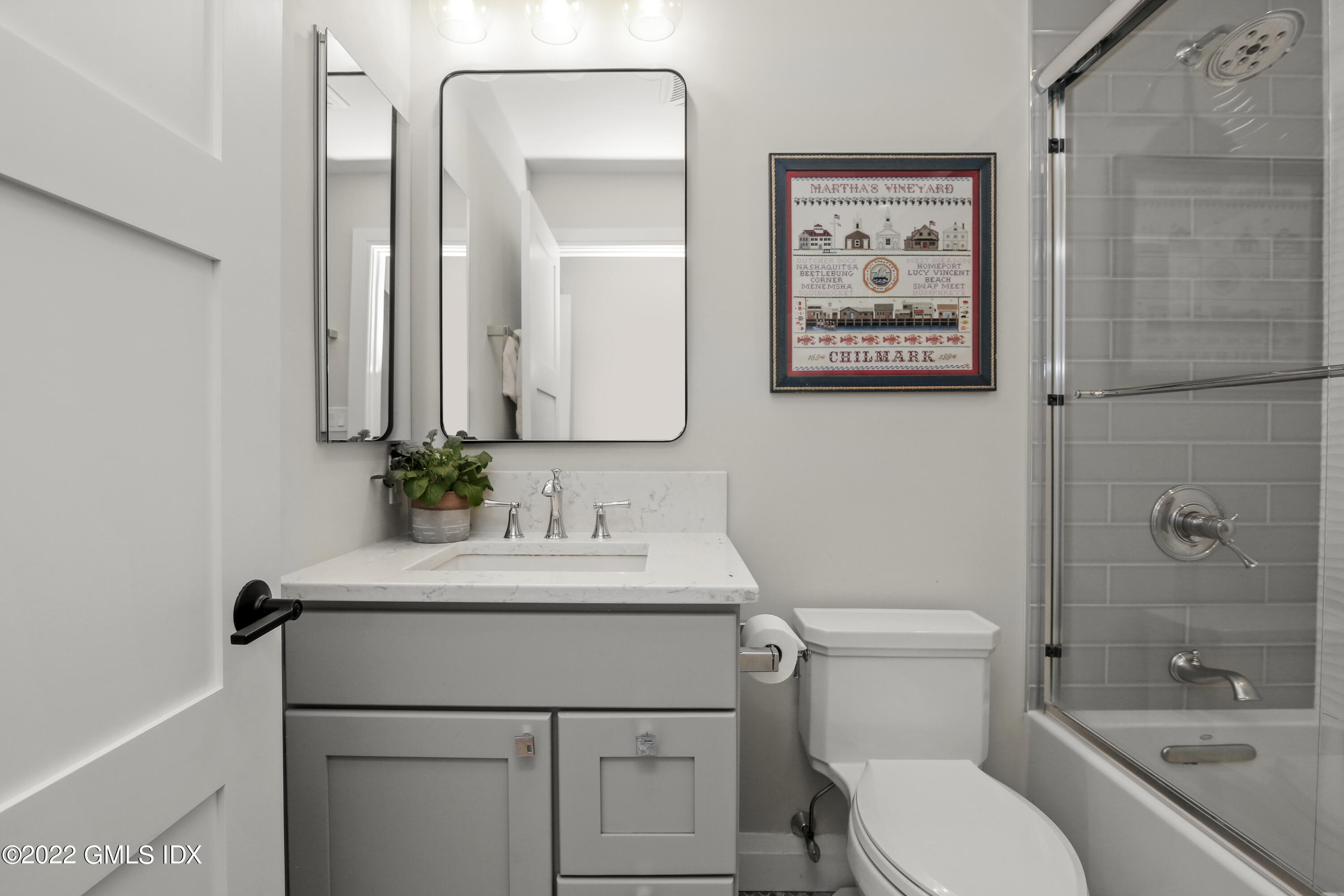 15 River Road, Unit 213 Cos Cob, CT 06807 - Photo 16 of 20 a bathroom with a toilet sink and shower