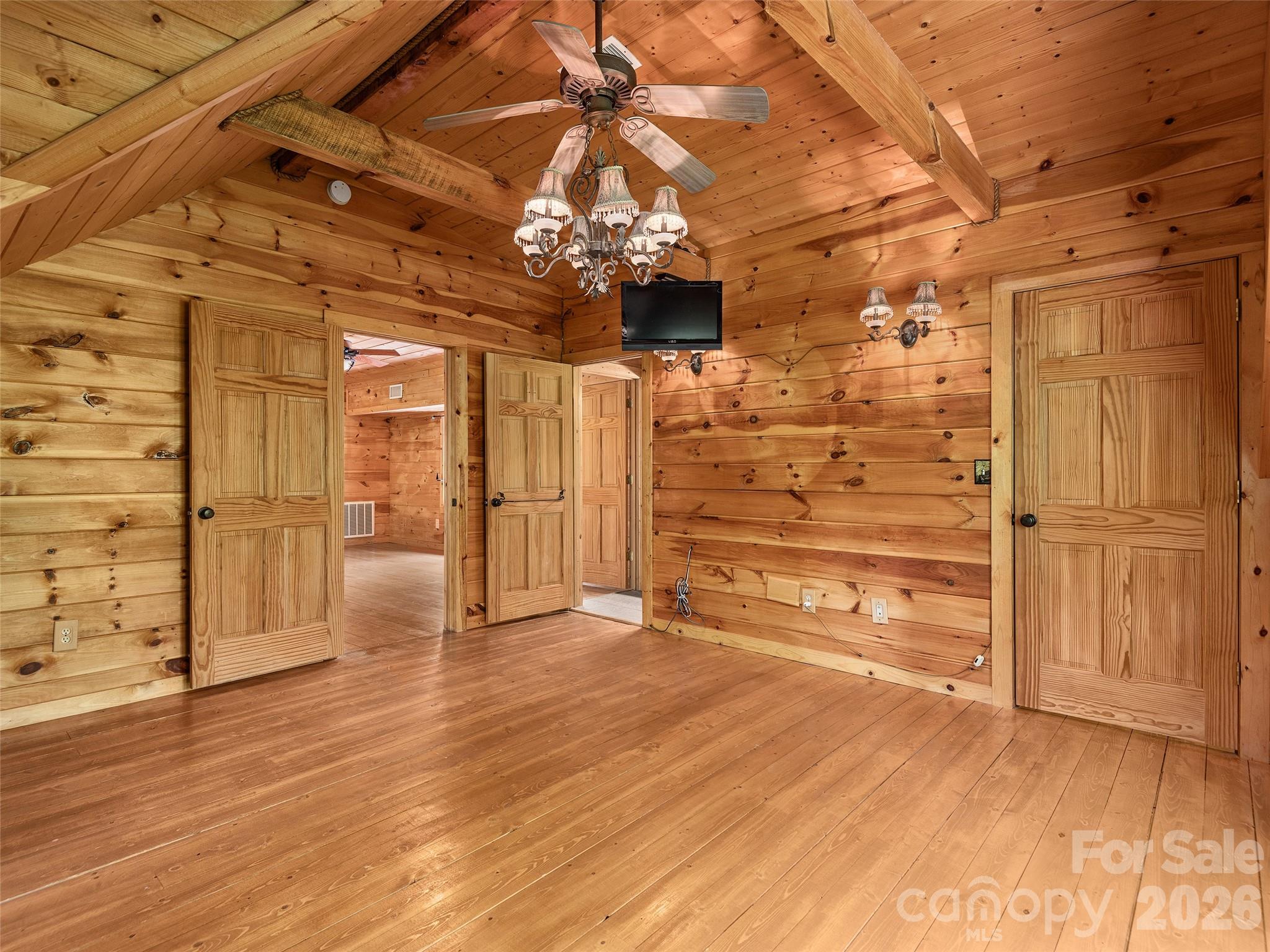 413 Green Hills Road Mill Spring, NC 28756 - Photo 27 of 48 a view of a room with wooden floor
