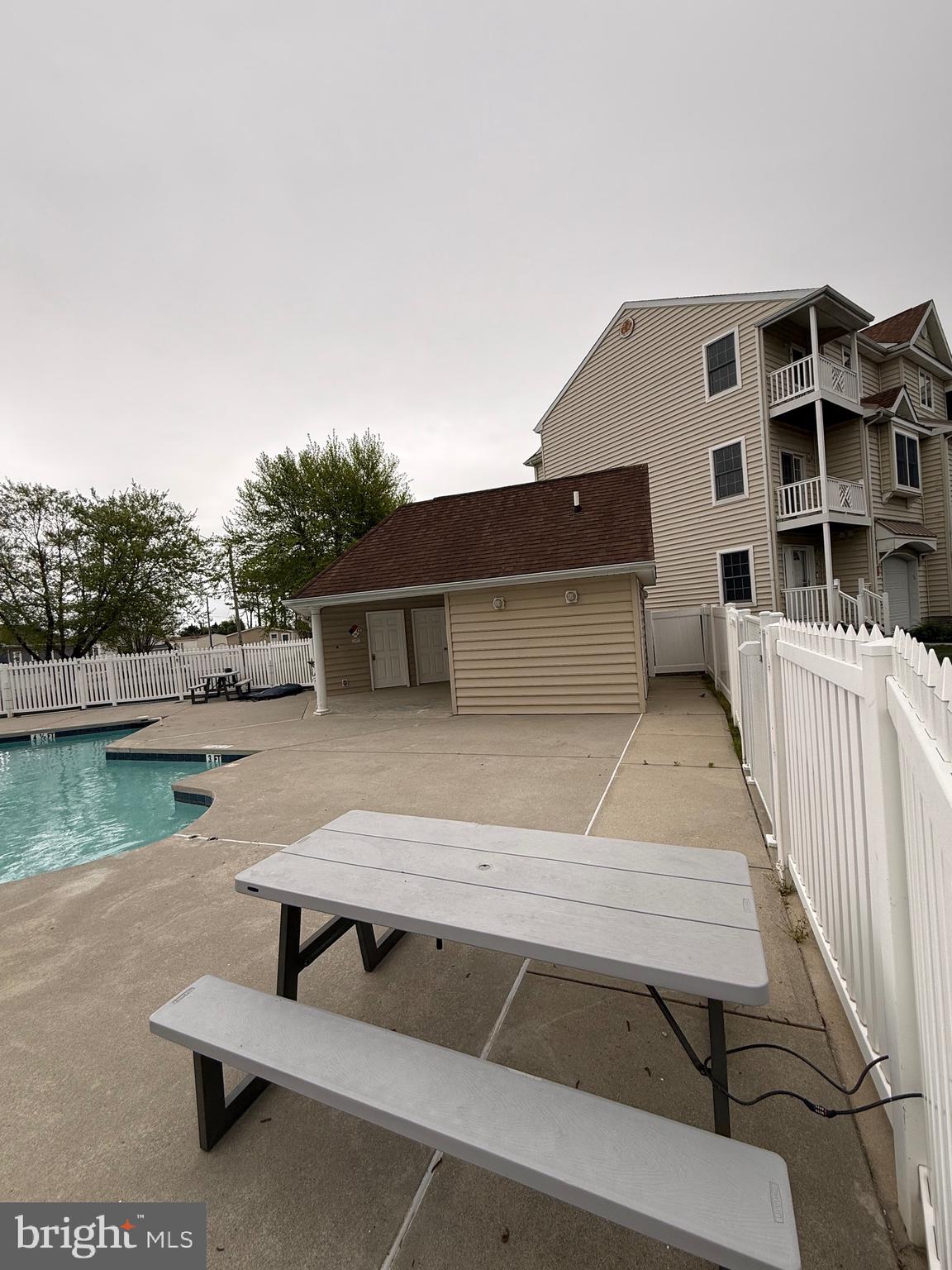 9823 Golf Course Road, Unit 20 Ocean City, MD 21842 - Photo 12 of 61 Patio and deck by pool