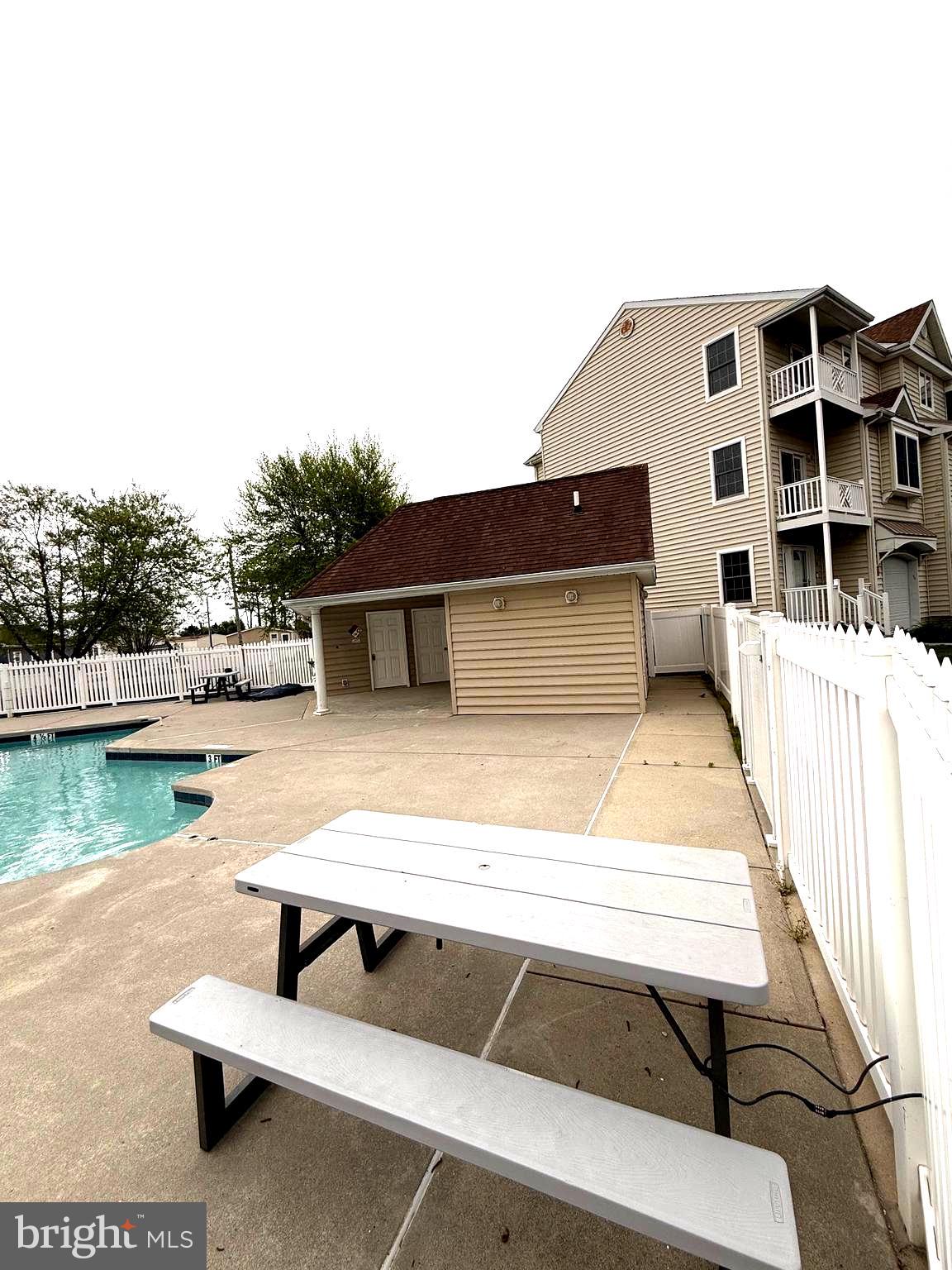 9823 Golf Course Road, Unit 20 Ocean City, MD 21842 - Photo 12 of 61 a view of outdoor space with seating area