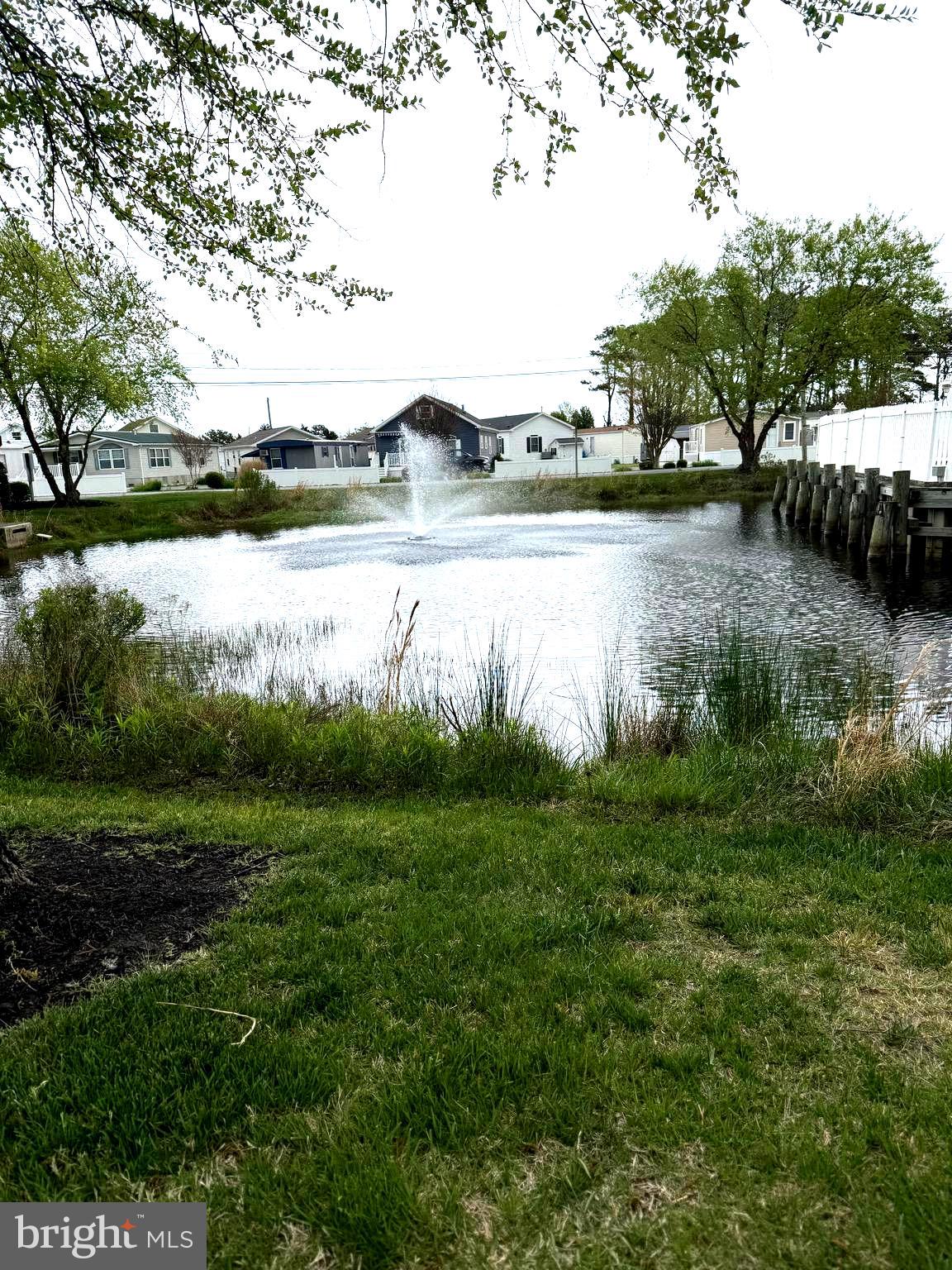 9823 Golf Course Road, Unit 20 Ocean City, MD 21842 - Photo 14 of 61 Entrance Pond w/fountain