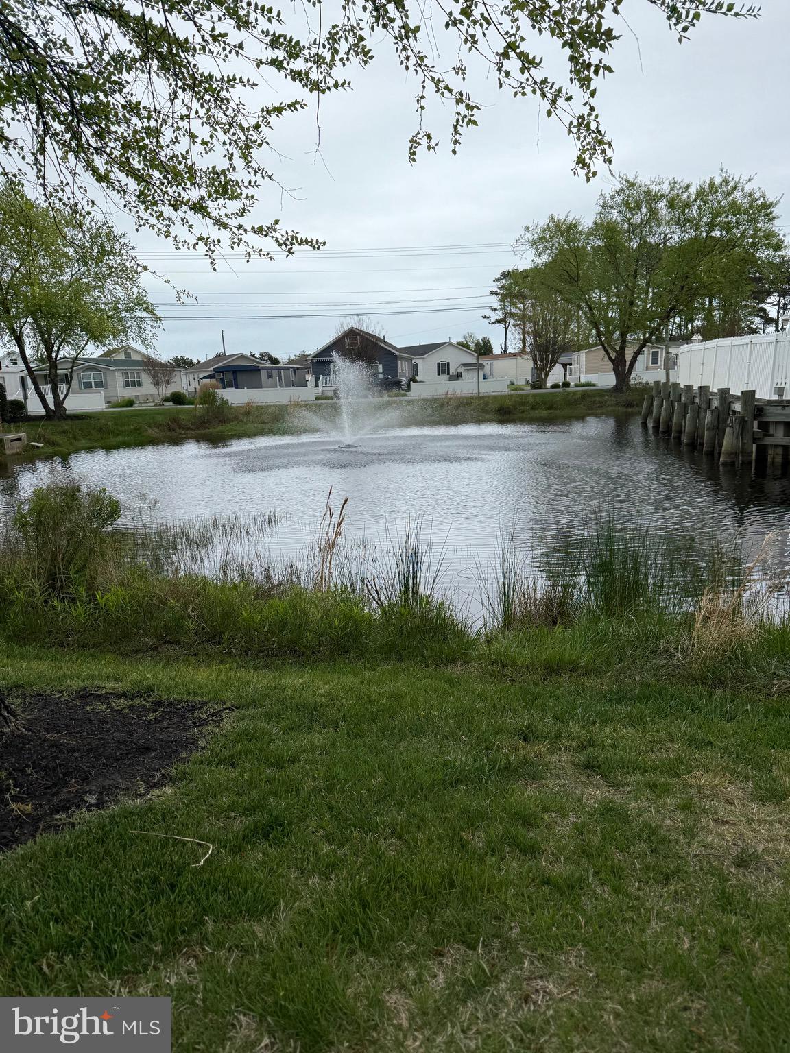 9823 Golf Course Road, Unit 20 Ocean City, MD 21842 - Photo 14 of 61 Entrance Pond w/fountain