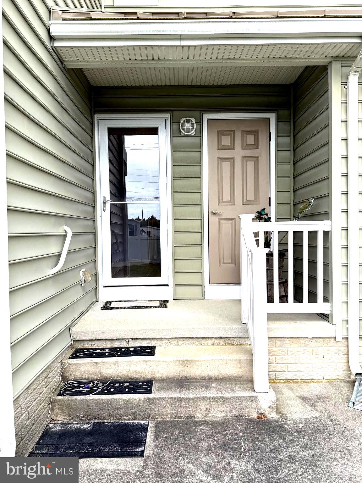 9823 Golf Course Road, Unit 20 Ocean City, MD 21842 - Photo 19 of 61 a view of entrance gate of a house