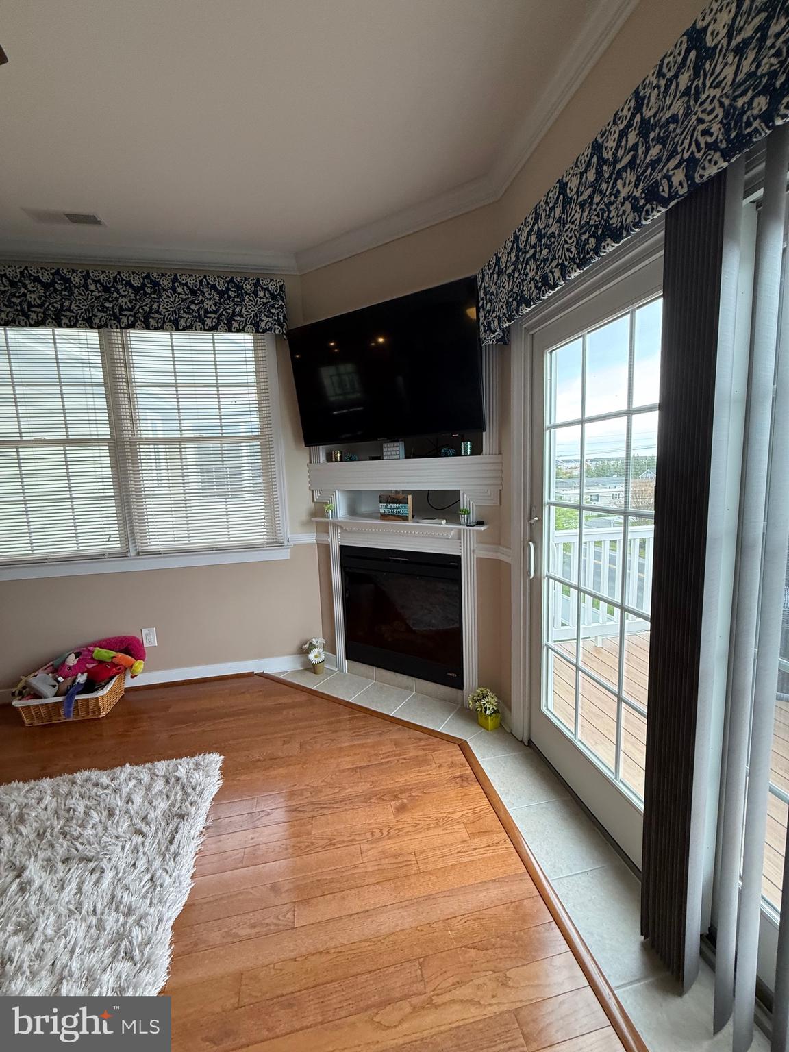 9823 Golf Course Road, Unit 20 Ocean City, MD 21842 - Photo 27 of 61 Top level corner TV and FP set up