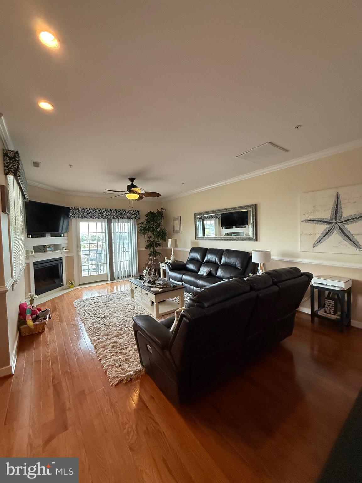 9823 Golf Course Road, Unit 20 Ocean City, MD 21842 - Photo 29 of 61 Living area sliders exit to deck & skyline views