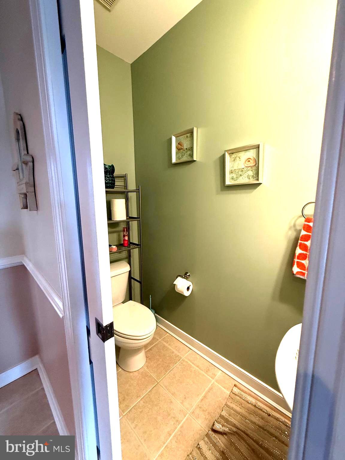 9823 Golf Course Road, Unit 20 Ocean City, MD 21842 - Photo 34 of 61 a bathroom with a sink and a toilet