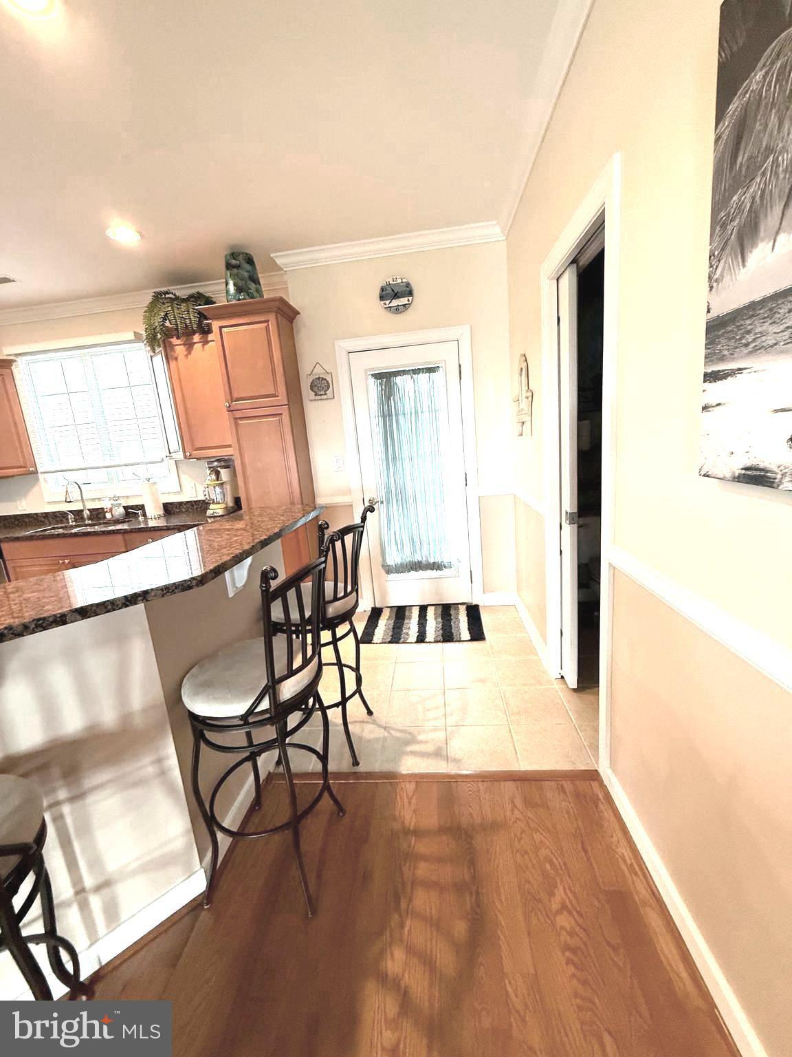 9823 Golf Course Road, Unit 20 Ocean City, MD 21842 - Photo 35 of 61 Exit to porch