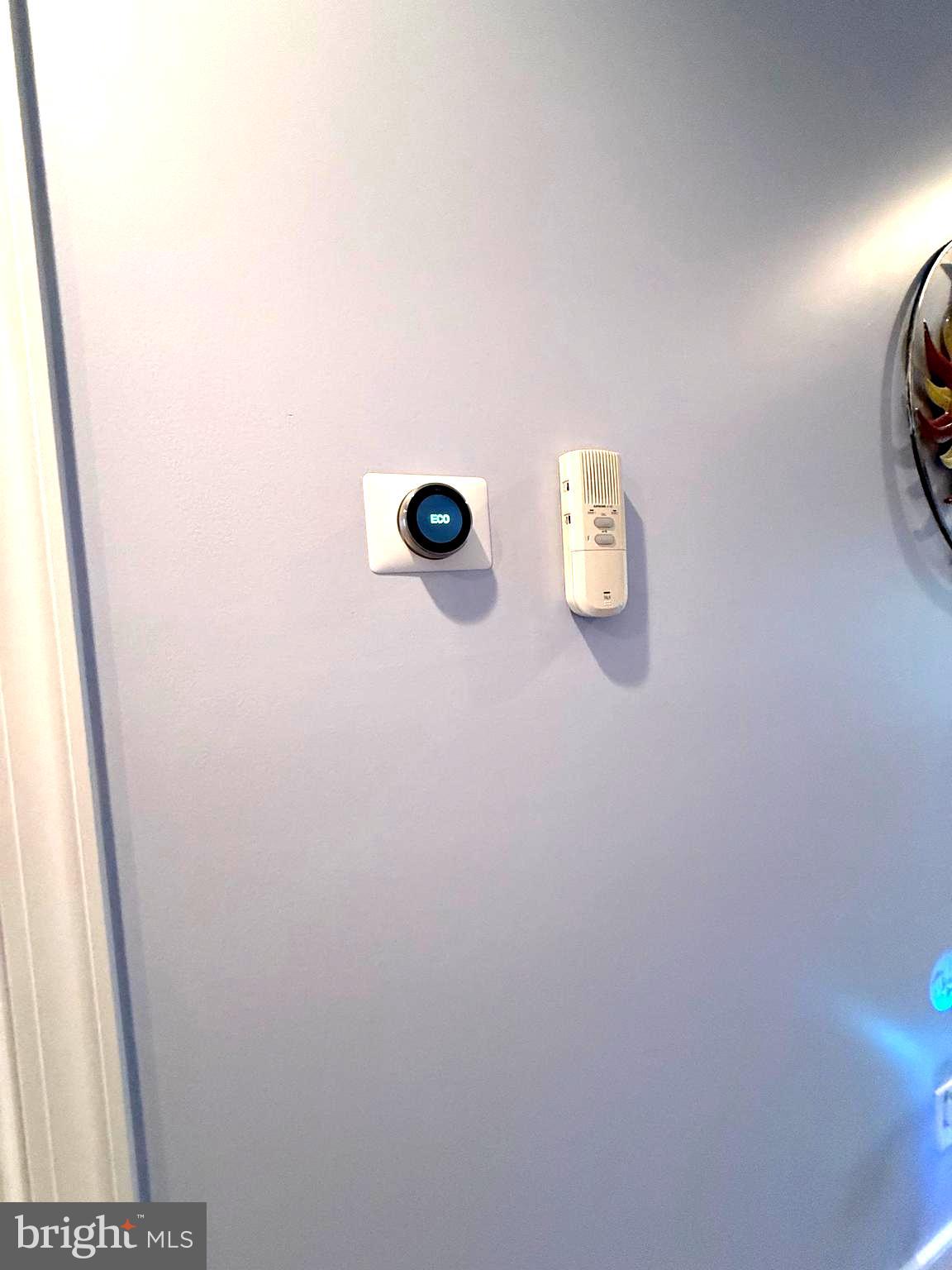 9823 Golf Course Road, Unit 20 Ocean City, MD 21842 - Photo 41 of 61 Nest thermostat controls main & 2nd floor Heat