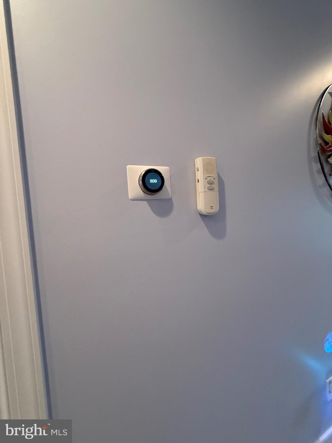9823 Golf Course Road, Unit 20 Ocean City, MD 21842 - Photo 41 of 61 Nest thermostat controls main & 2nd floor Heat
