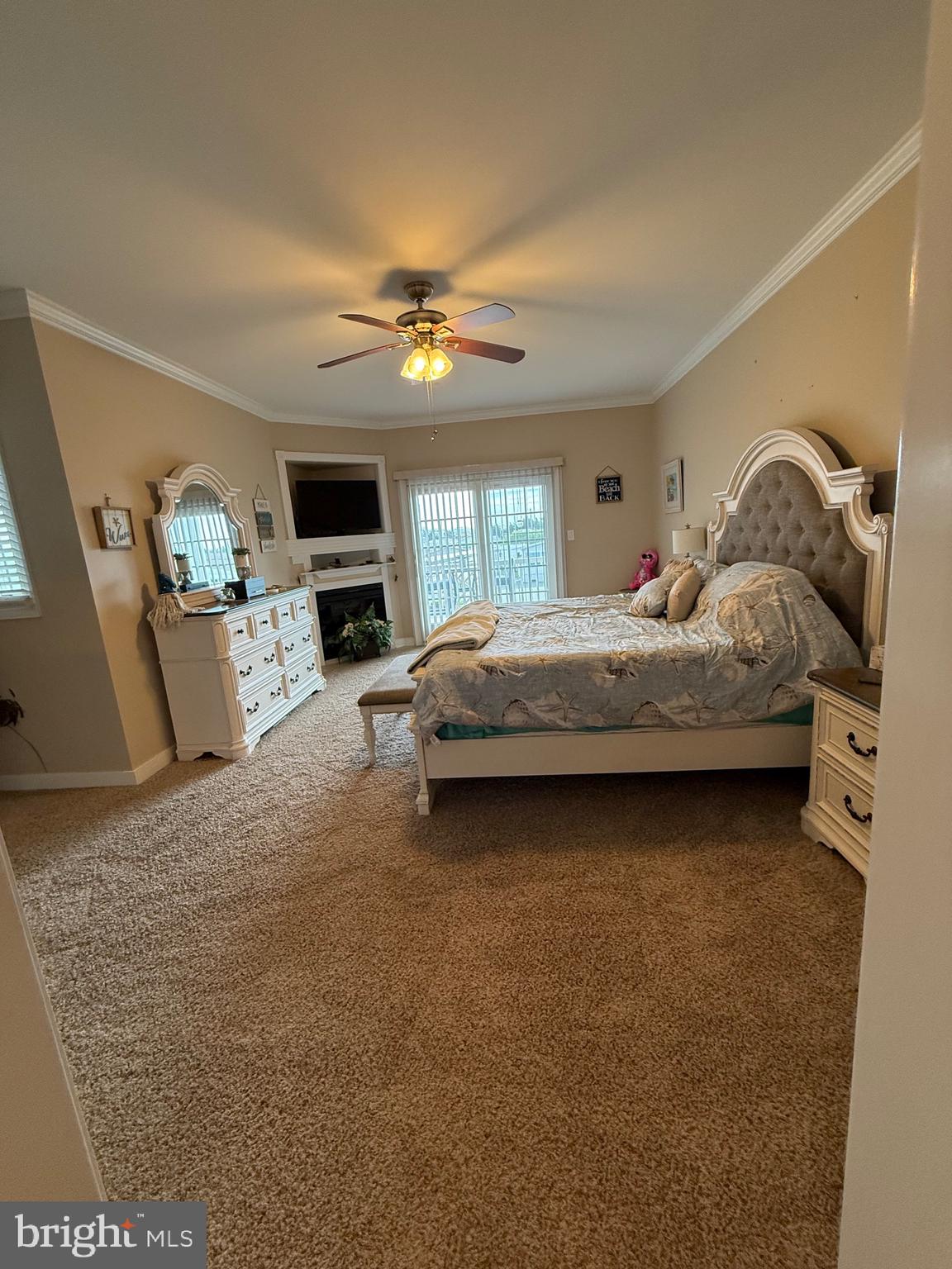 9823 Golf Course Road, Unit 20 Ocean City, MD 21842 - Photo 44 of 61 Primary BR with sliders to deck