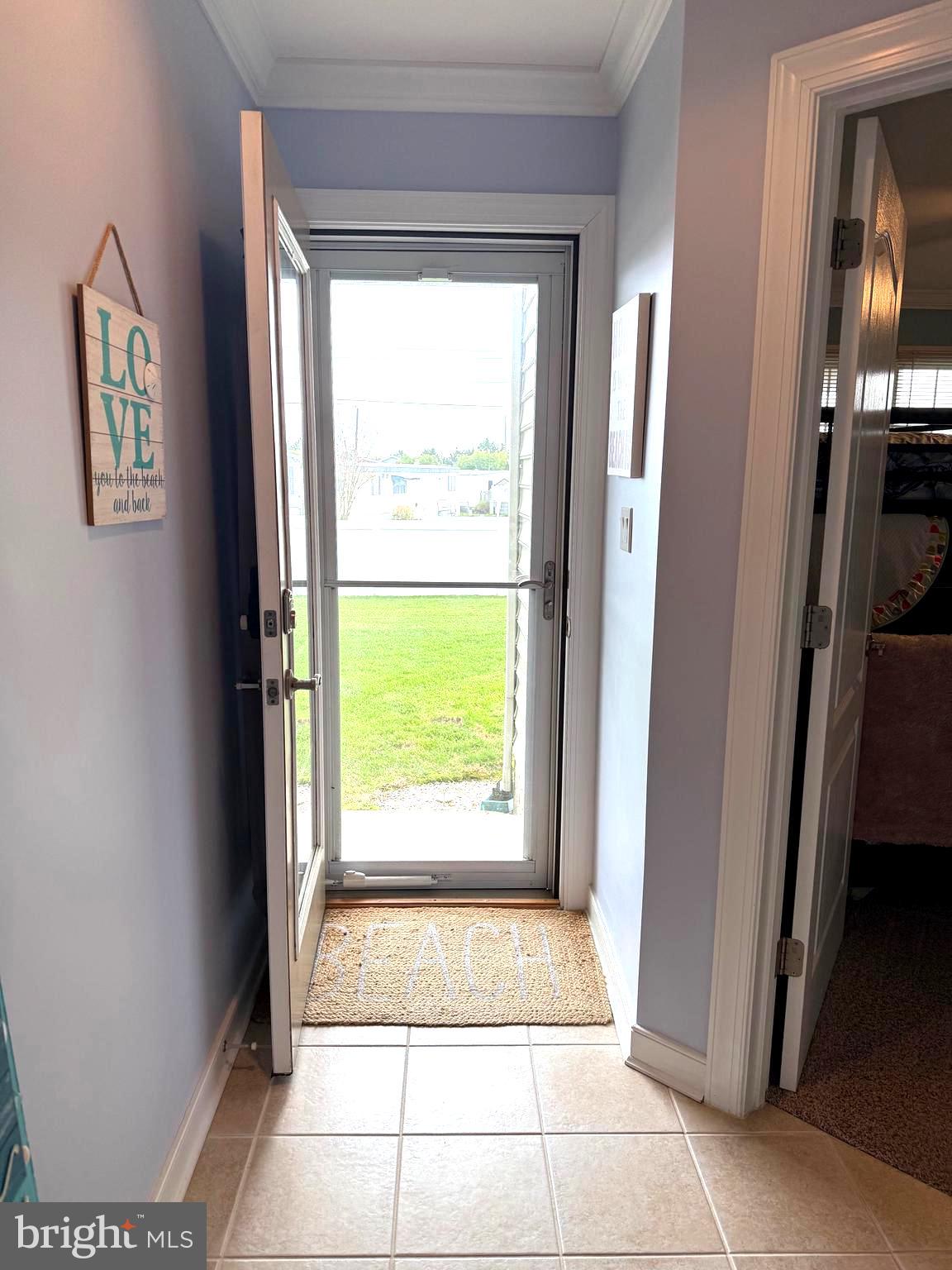 9823 Golf Course Road, Unit 20 Ocean City, MD 21842 - Photo 57 of 61 Entry to back porch and yard