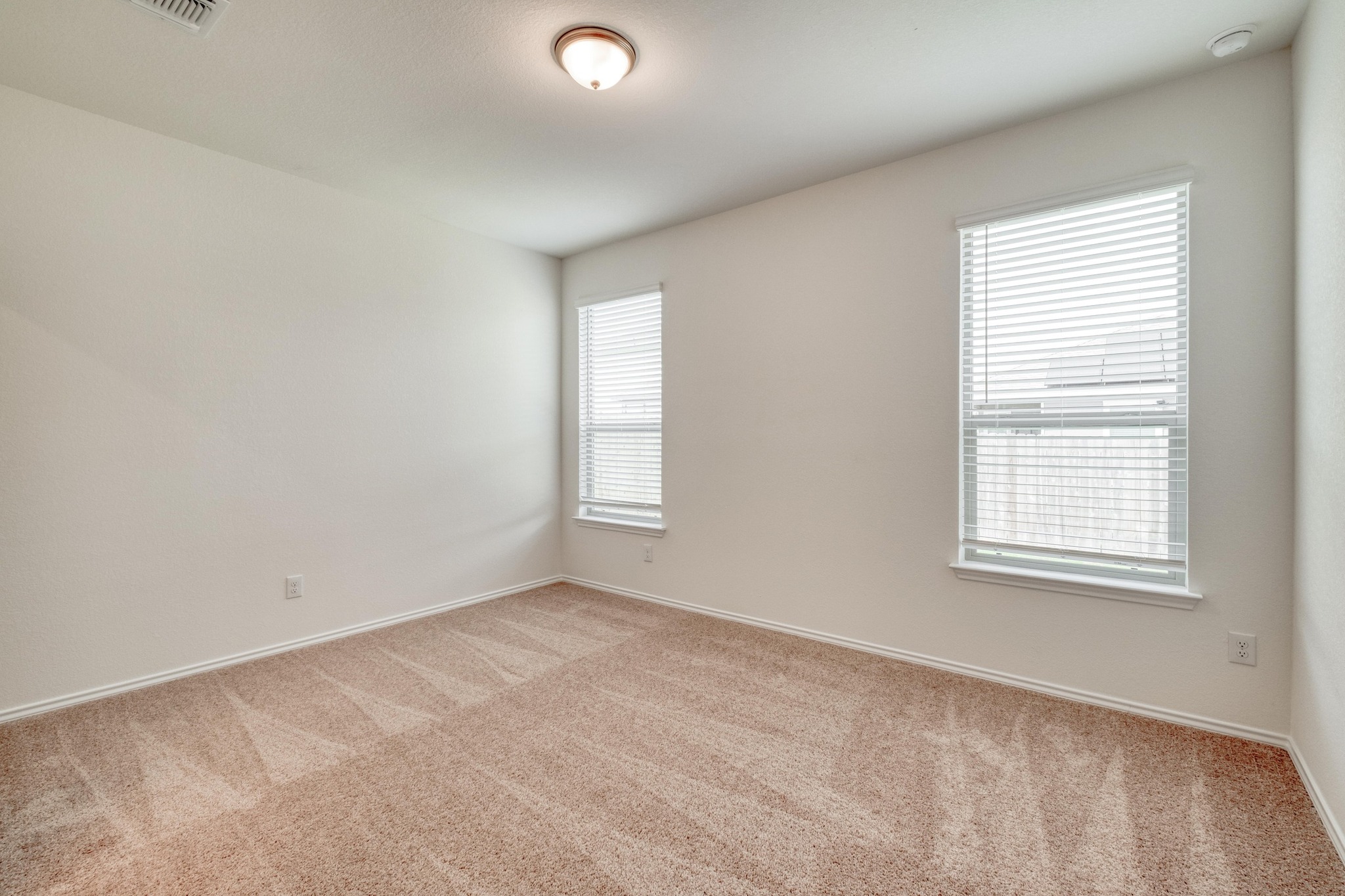 280 Feathers Street Jarrell, TX 76537 - Photo 16 of 28 an empty room with a window