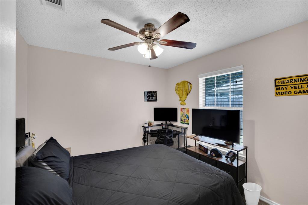 1001 Short Line Boulevard Midlothian, TX 76065 - Photo 8 of 26 Bedroom featuring a ceiling fan with light fixture, window with blinds, and neutral wall paint
