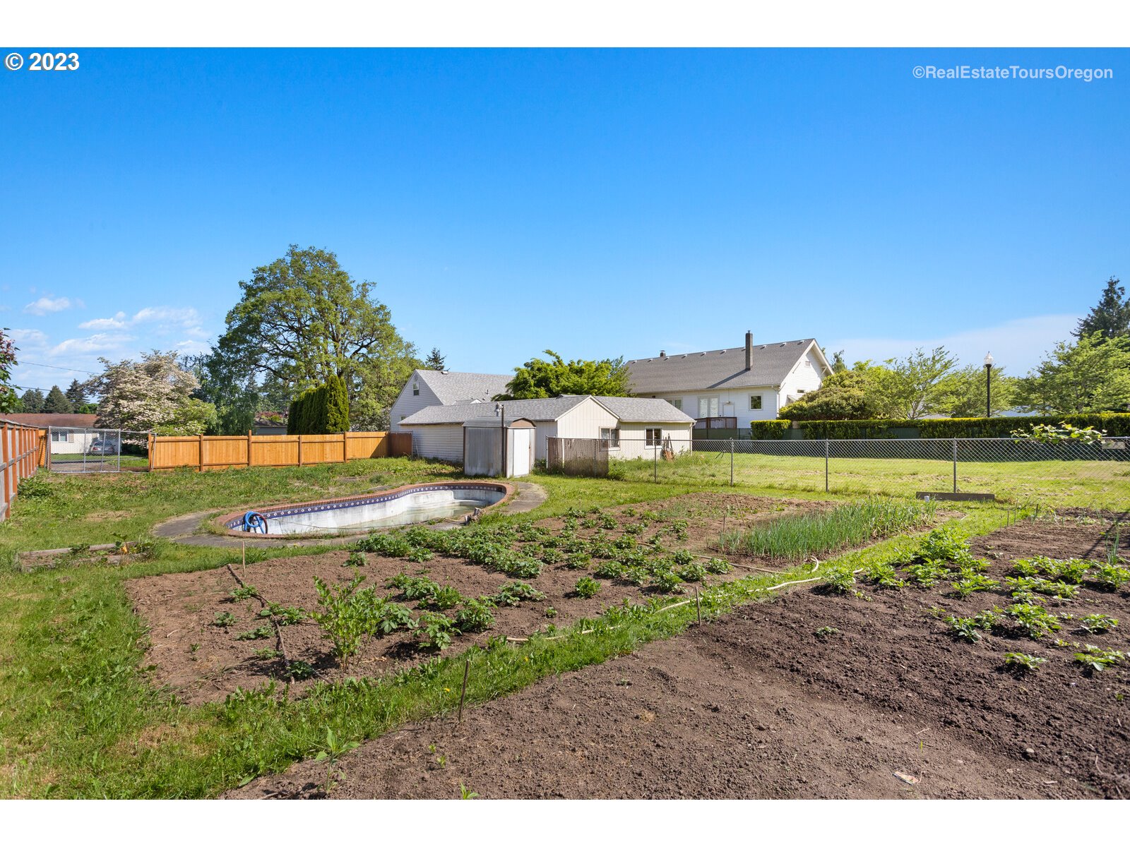 330 Harrison Street Fairview, OR 97024 - Photo 13 of 20 a view of a lake with a house in the background