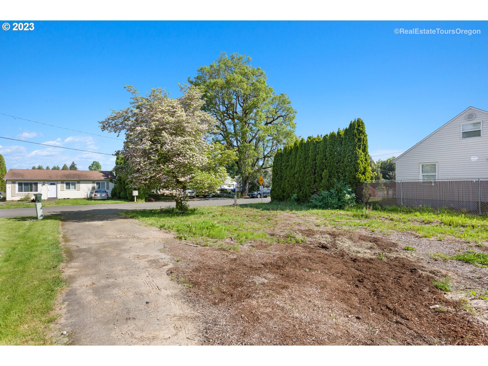 330 Harrison Street Fairview, OR 97024 - Photo 7 of 20 a view of a yard with a house