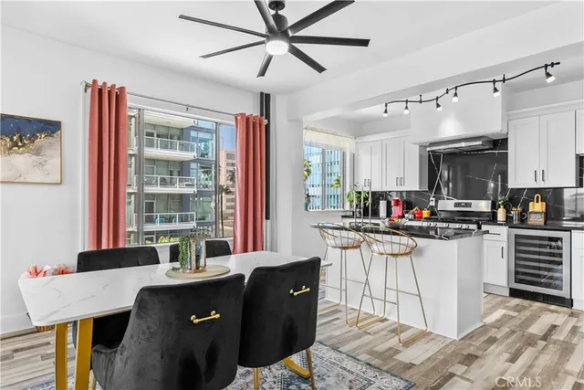 a kitchen with a sink cabinets and window