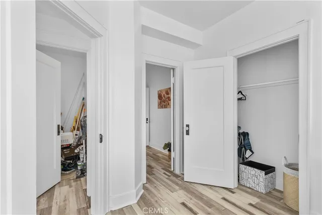 a view of a bathroom from a hallway