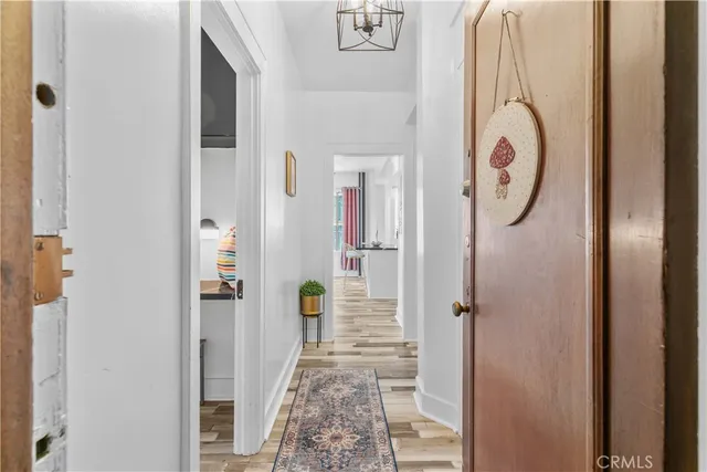 a bathroom with a granite countertop shower and a mirror