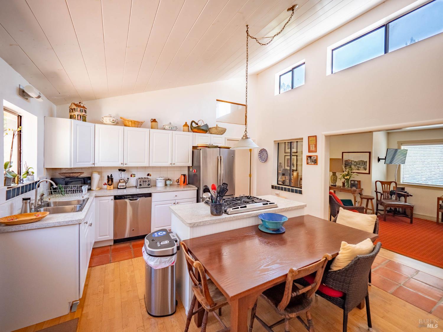 2151 Highway 128 Philo, CA 95466 - Photo 25 of 55 a kitchen with a table chairs and white appliances