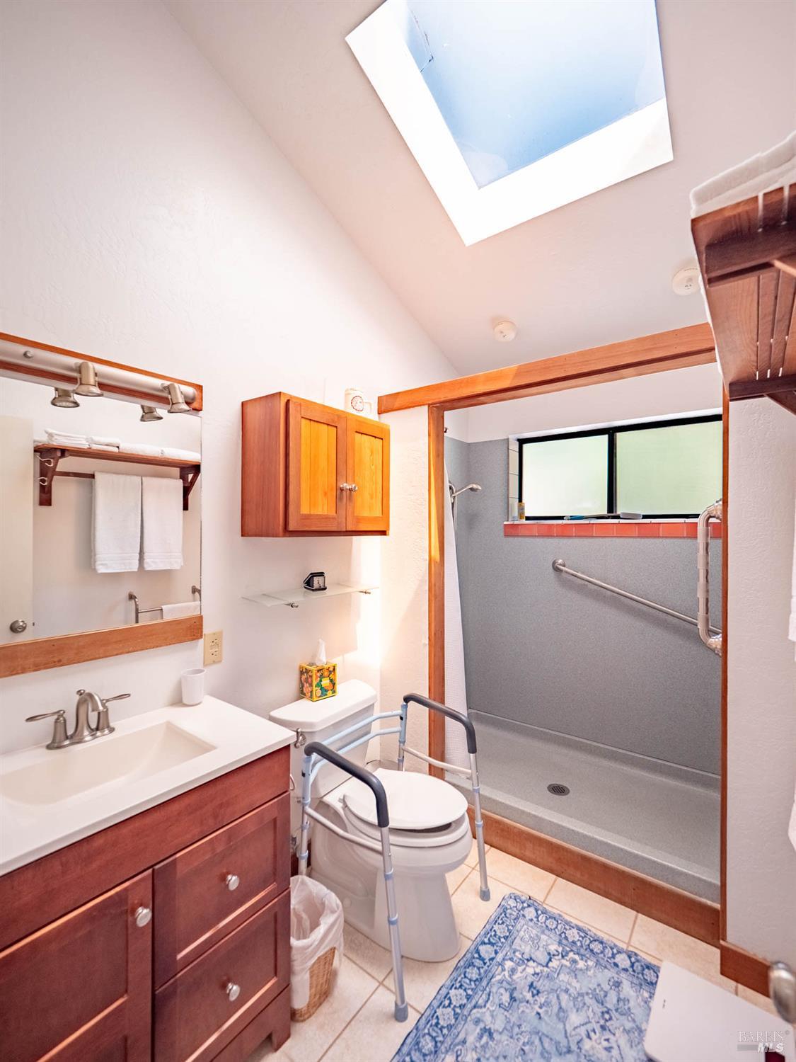 2151 Highway 128 Philo, CA 95466 - Photo 30 of 55 a bathroom with a sink a toilet and shower