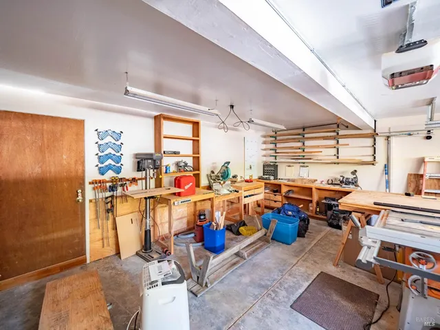 a room with lots of tables and chairs