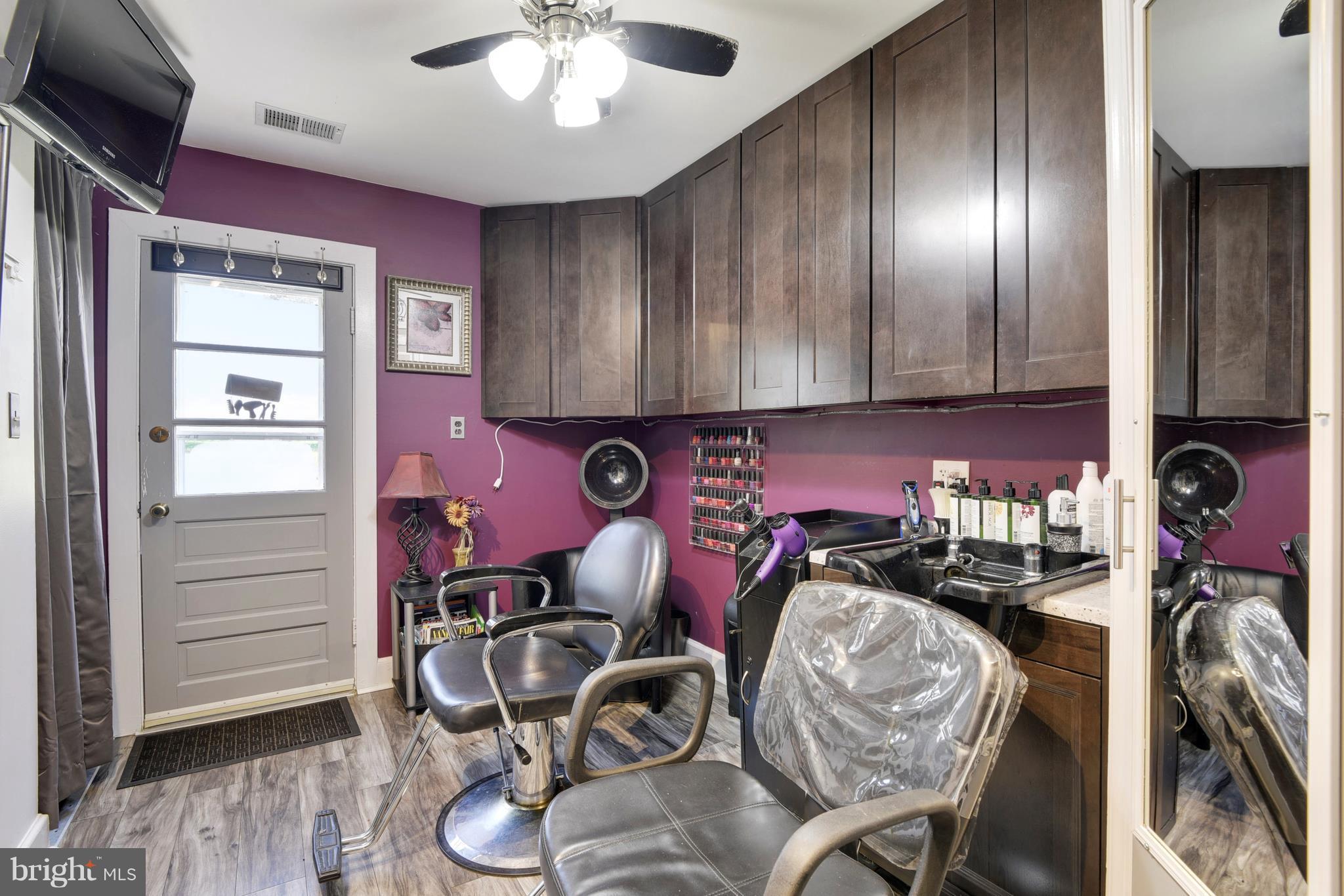 5734 Swamp Circle Road Deale, MD 20751 - Photo 26 of 30 a view of a room with gym equipment