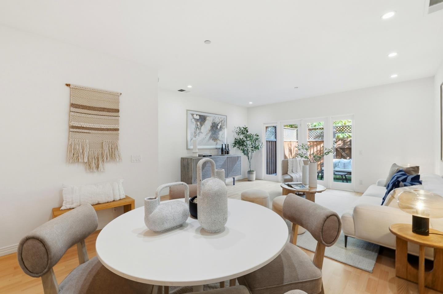 1835 Palm View Place, Unit 105 Santa Clara, CA 95050 - Photo 13 of 49 a living room with furniture kitchen view and a large window