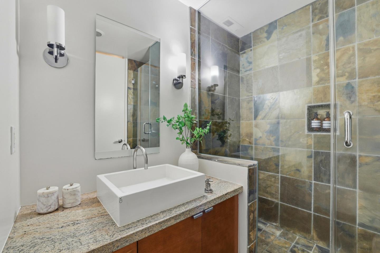 1835 Palm View Place, Unit 105 Santa Clara, CA 95050 - Photo 18 of 49 a bathroom with a sink a toilet and shower