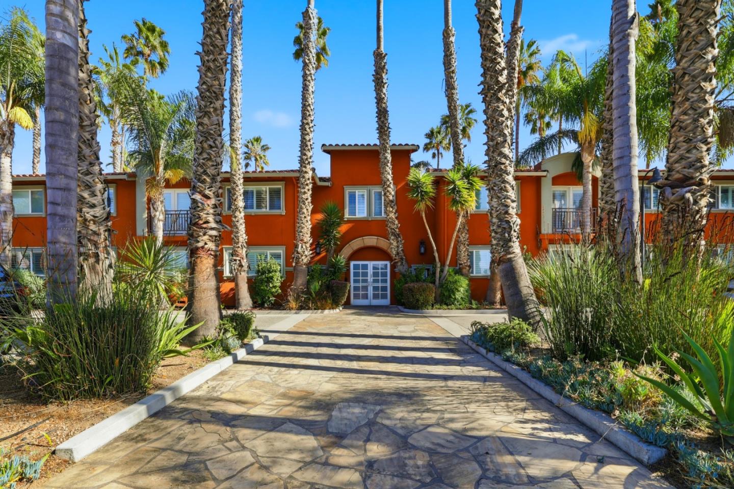 1835 Palm View Place, Unit 105 Santa Clara, CA 95050 - Photo 2 of 49 a front view of a house with a yard