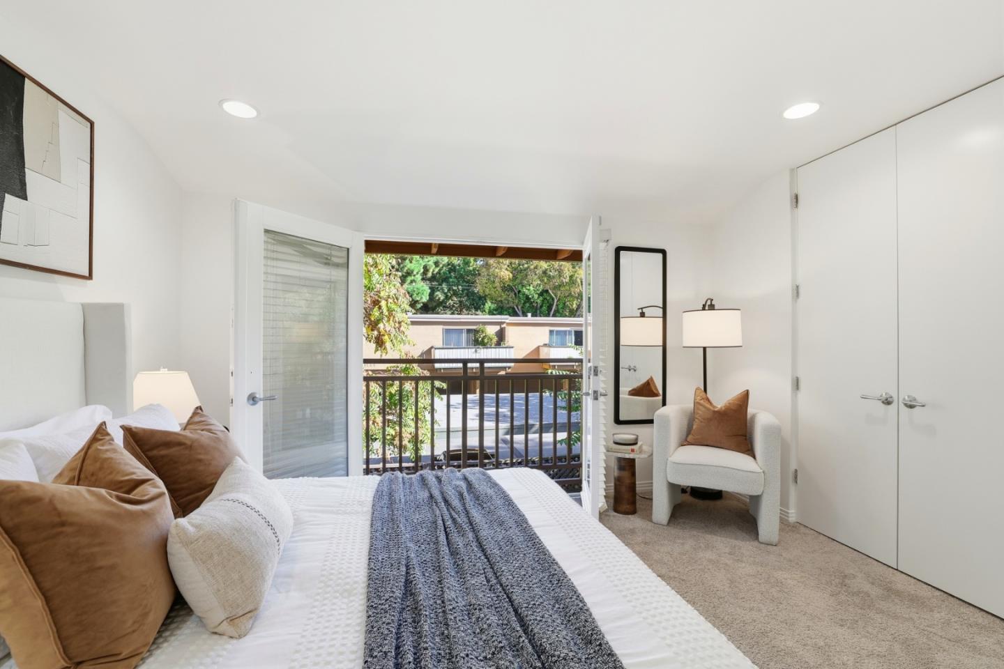 1835 Palm View Place, Unit 105 Santa Clara, CA 95050 - Photo 21 of 49 a bedroom with furniture and a large window