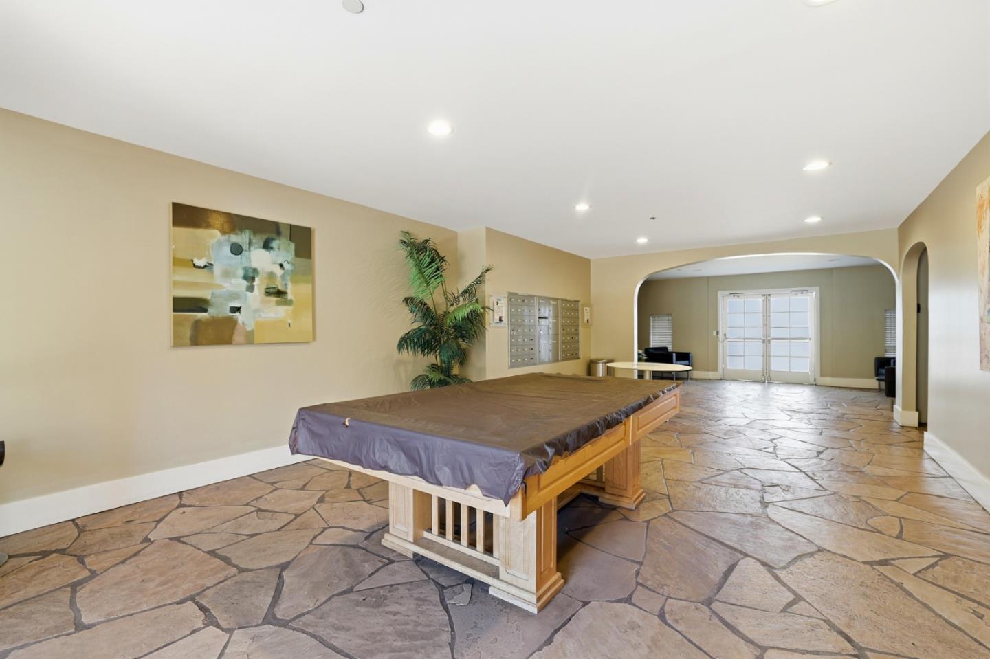1835 Palm View Place, Unit 105 Santa Clara, CA 95050 - Photo 43 of 49 a room with pool table and a table