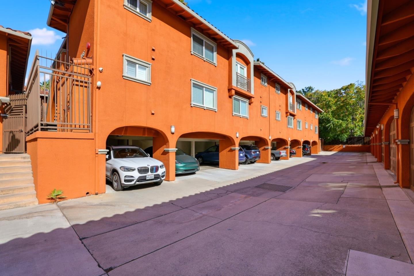 1835 Palm View Place, Unit 105 Santa Clara, CA 95050 - Photo 44 of 49 a car parked in front of a building