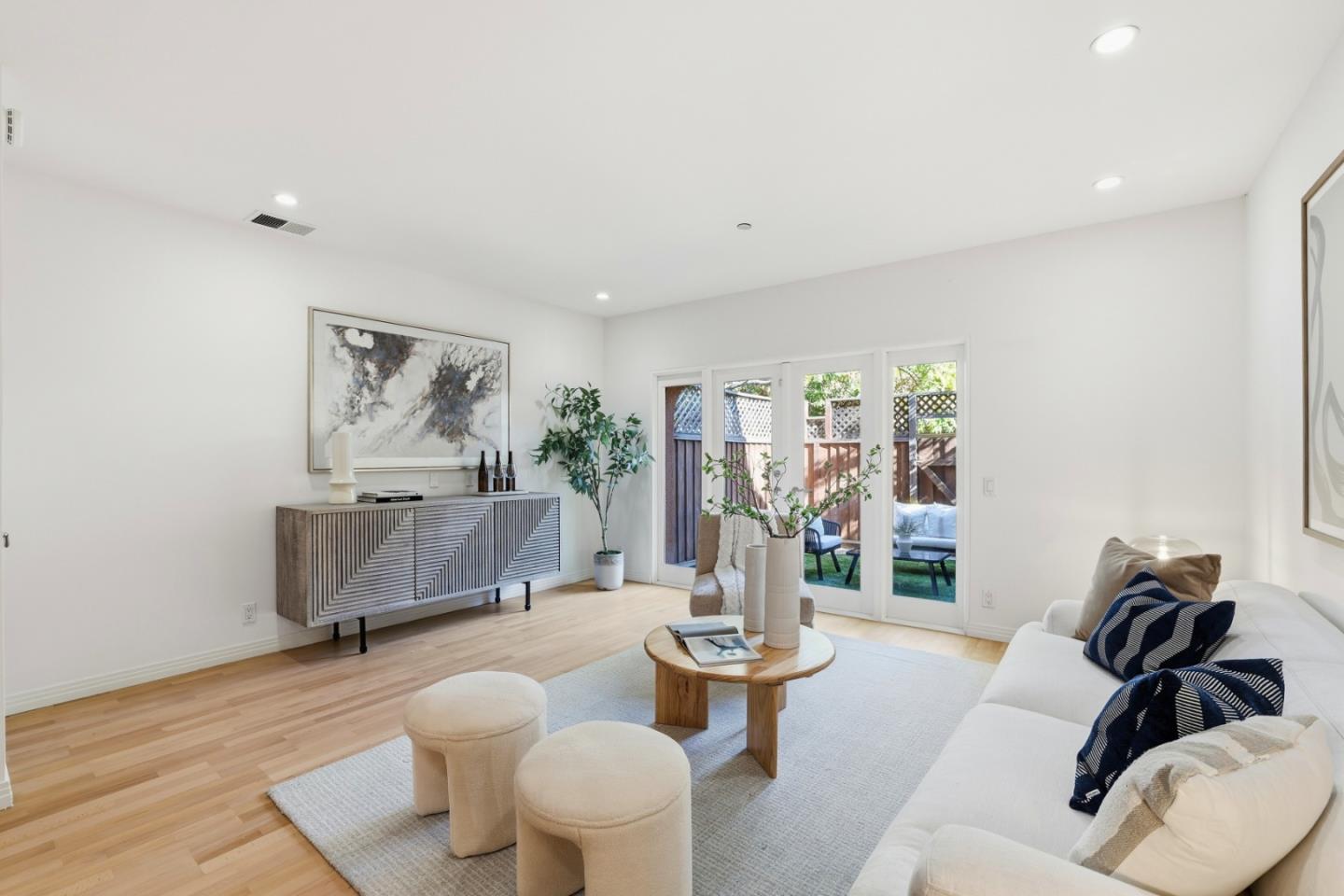 1835 Palm View Place, Unit 105 Santa Clara, CA 95050 - Photo 5 of 49 a living room with furniture and a large window