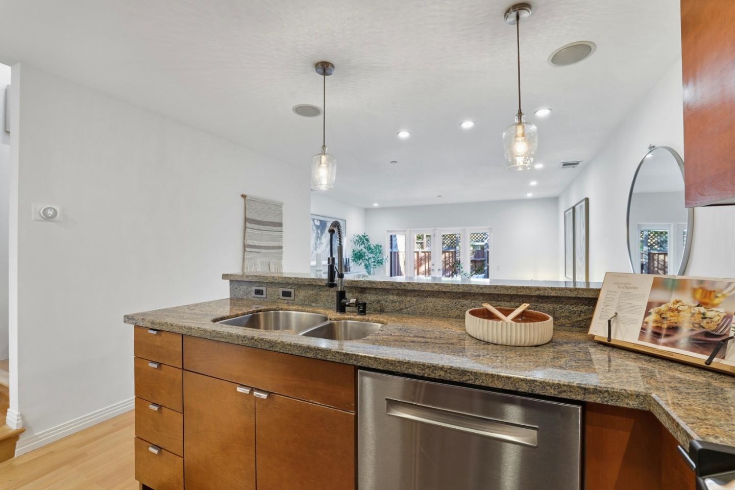 1835 Palm View Place, Unit 105 Santa Clara, CA 95050 - Photo 9 of 49 a kitchen with granite countertop a sink a counter space and cabinets
