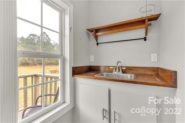 945 Field Trial Road Camden, SC 29020 - Photo 15 of 19 a kitchen with a sink and a window