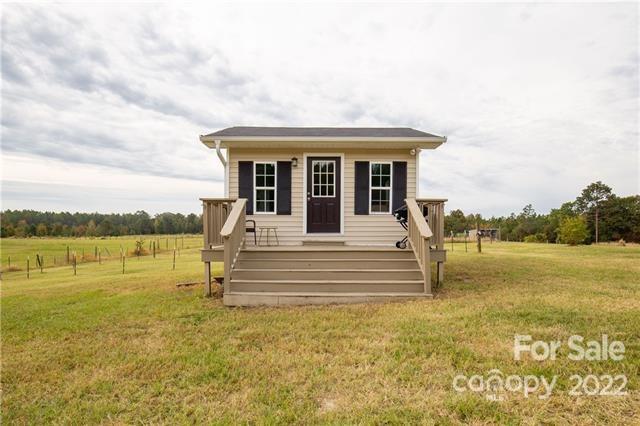 945 Field Trial Road Camden, SC 29020 - Photo 17 of 19 a view of a house with a ocean view