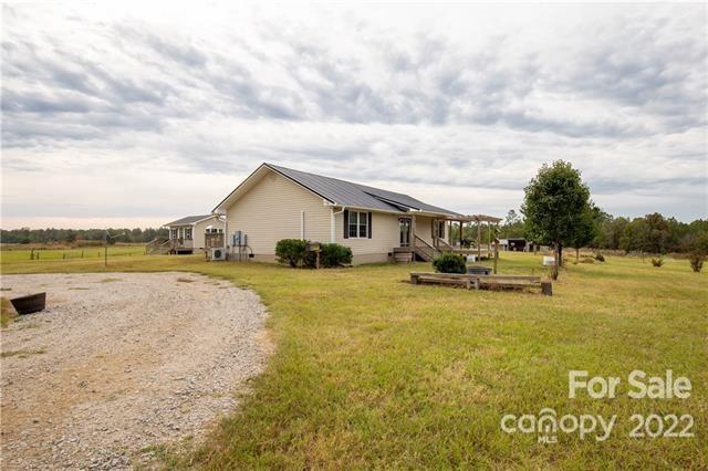 945 Field Trial Road Camden, SC 29020 - Photo 18 of 19 a view of a house with a yard