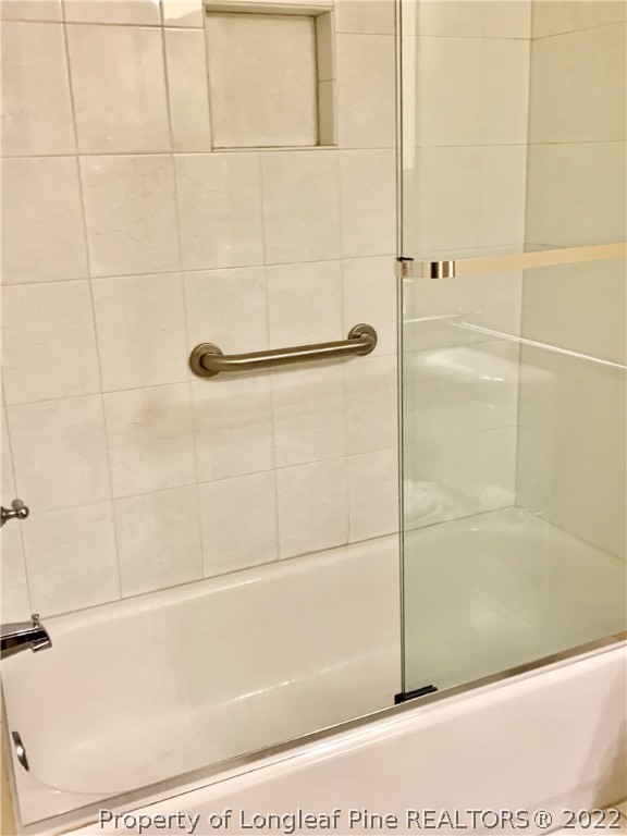 2651 Lockwood Road Fayetteville, NC 28303 - Photo 11 of 18 a bathroom with a shower