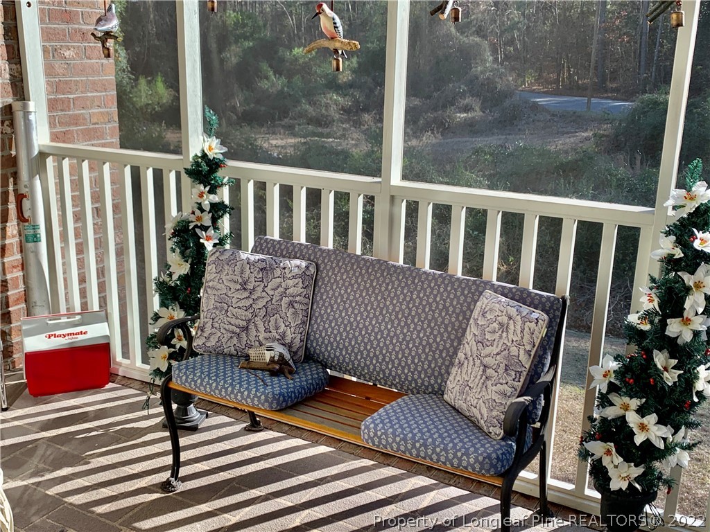 2651 Lockwood Road Fayetteville, NC 28303 - Photo 15 of 18 a view of a bench in balcony
