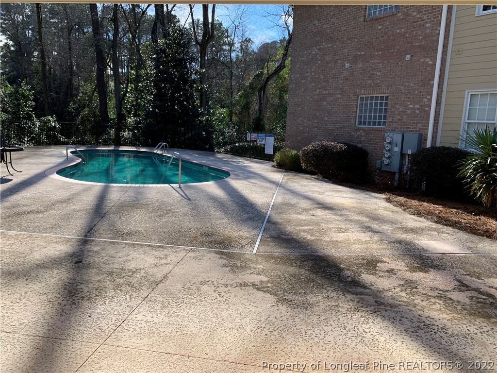 2651 Lockwood Road Fayetteville, NC 28303 - Photo 17 of 18 a view of swimming pool with a yard