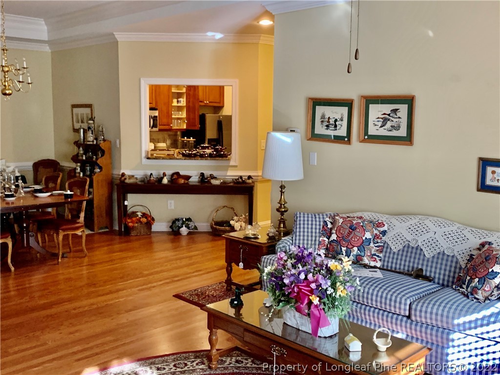 2651 Lockwood Road Fayetteville, NC 28303 - Photo 5 of 18 a living room with furniture and wooden floor
