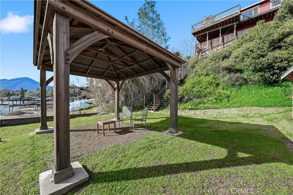 a view of a backyard with a tub