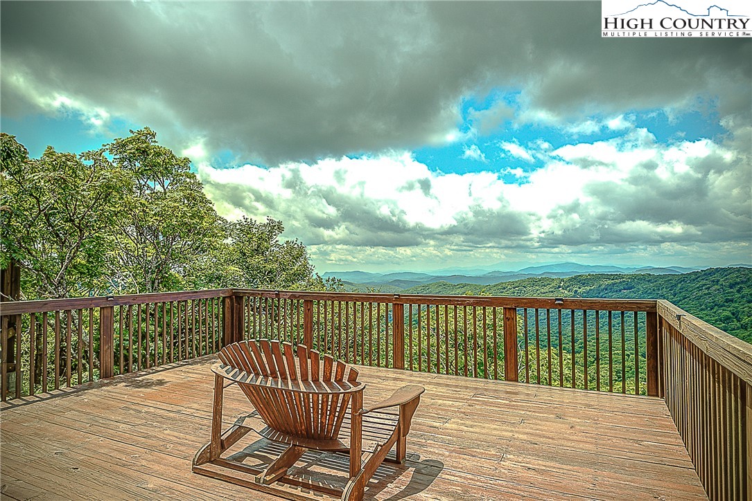 303 Sugar Top Drive, Unit 2407 Sugar Mountain, NC 28604 - Photo 36 of 36 a view of a wooden deck with furniture