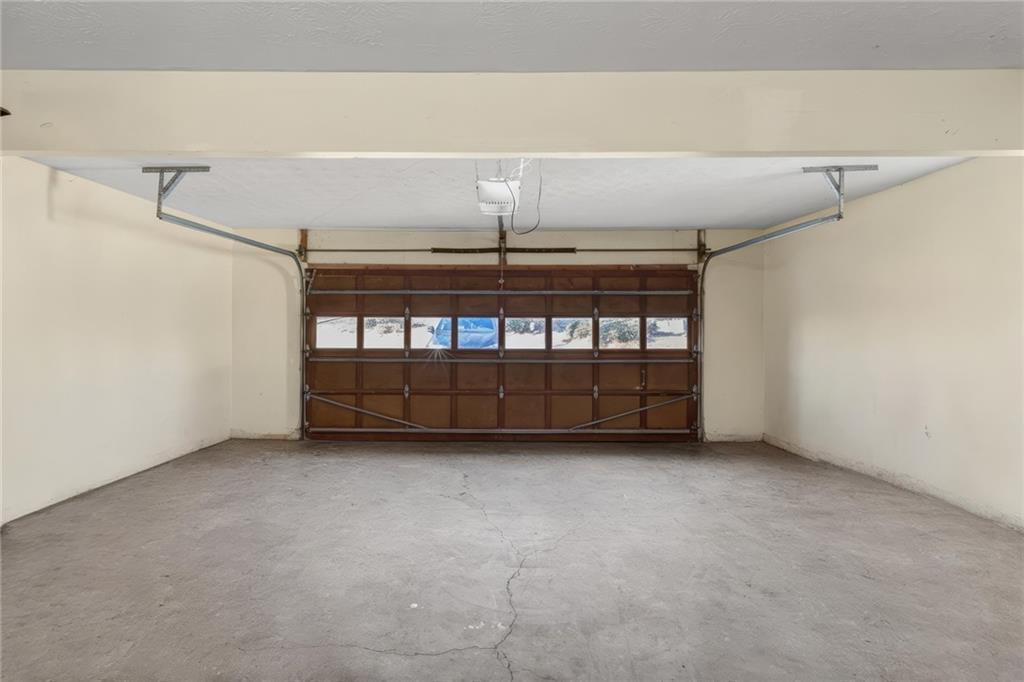 705 Springview Court Roswell, GA 30076 - Photo 29 of 79 a view of an empty room with windows