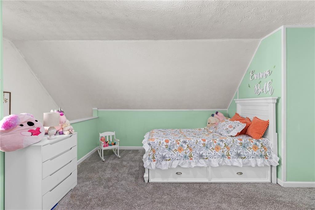 705 Springview Court Roswell, GA 30076 - Photo 34 of 79 a bedroom with a bed and a window