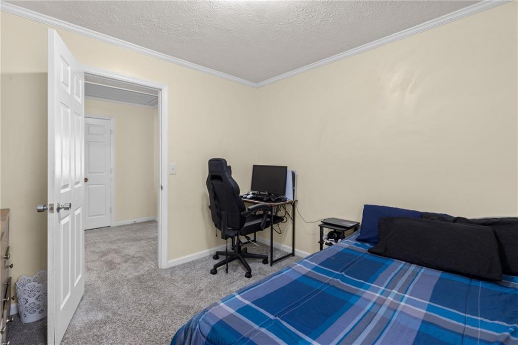 705 Springview Court Roswell, GA 30076 - Photo 50 of 79 a view of a workspace with furniture and wooden floor