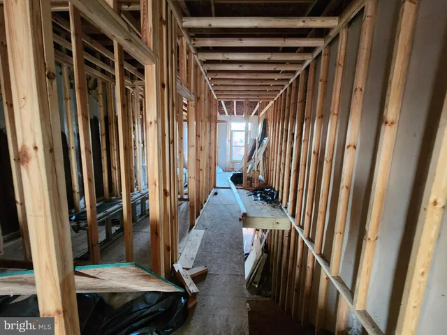 a view of a livingroom with furniture and windows