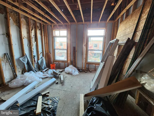 a view of a hallway with staircase